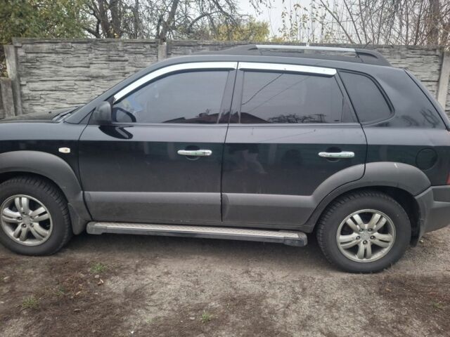 Черный Хендай Туксон, объемом двигателя 2 л и пробегом 224 тыс. км за 6800 $, фото 7 на Automoto.ua