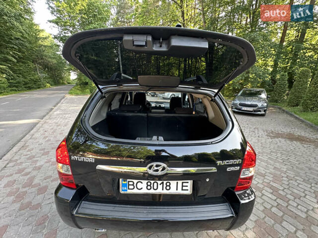 Черный Хендай Туксон, объемом двигателя 2 л и пробегом 210 тыс. км за 6600 $, фото 29 на Automoto.ua