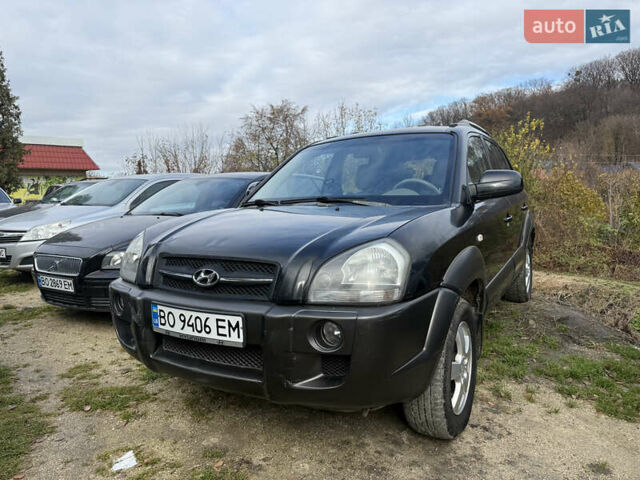 Черный Хендай Туксон, объемом двигателя 2 л и пробегом 211 тыс. км за 4444 $, фото 1 на Automoto.ua