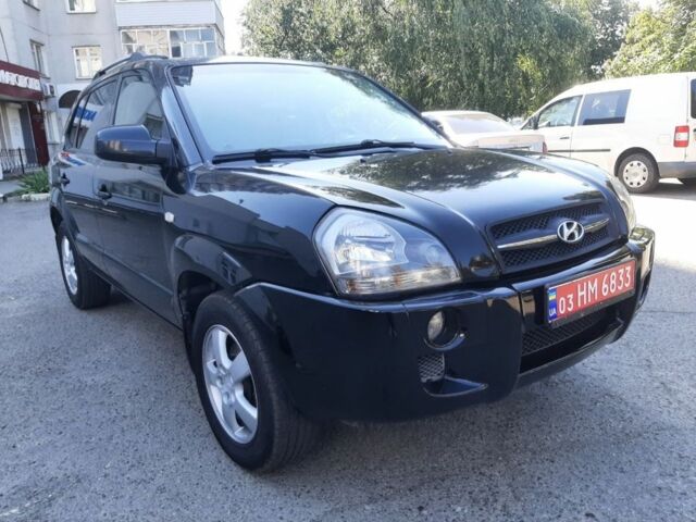 Чорний Хендай Туксон, об'ємом двигуна 2 л та пробігом 246 тис. км за 7850 $, фото 2 на Automoto.ua