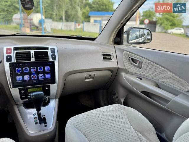 Черный Хендай Туксон, объемом двигателя 2 л и пробегом 225 тыс. км за 7900 $, фото 34 на Automoto.ua