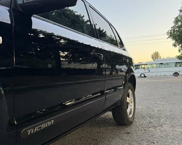 Хендай Туксон 2005 у Вознесенске на Automoto.ua Чорний Хендай Туксон, об'ємом двигуна 1.98 л та пробігом 144 тис. км за 7500 $, фото 5 на Automoto.ua