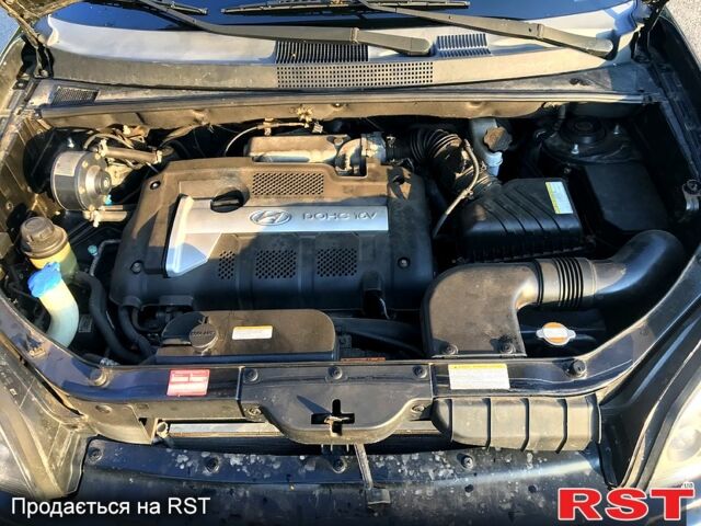 Хендай Туксон 2005 в Первомайском на Automoto.ua Черный Хендай Туксон, объемом двигателя 2 л и пробегом 253 тыс. км за 7700 $, фото 9 на Automoto.ua