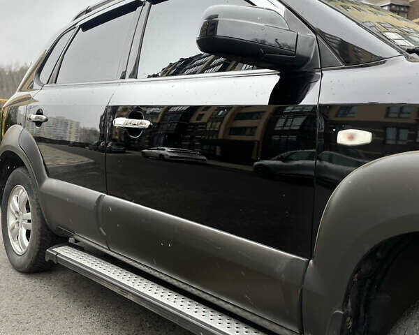 Чорний Хендай Туксон, об'ємом двигуна 1.98 л та пробігом 225 тис. км за 6600 $, фото 5 на Automoto.ua