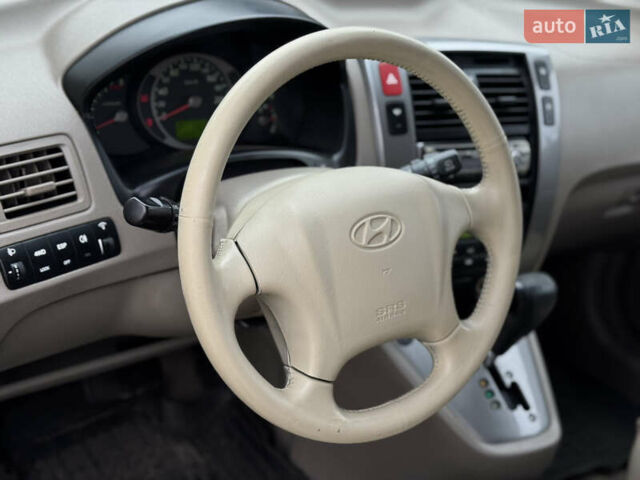 Черный Хендай Туксон, объемом двигателя 2.7 л и пробегом 220 тыс. км за 6950 $, фото 11 на Automoto.ua