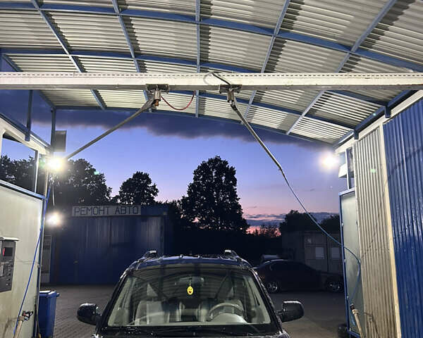 Черный Хендай Туксон, объемом двигателя 2 л и пробегом 217 тыс. км за 7552 $, фото 8 на Automoto.ua