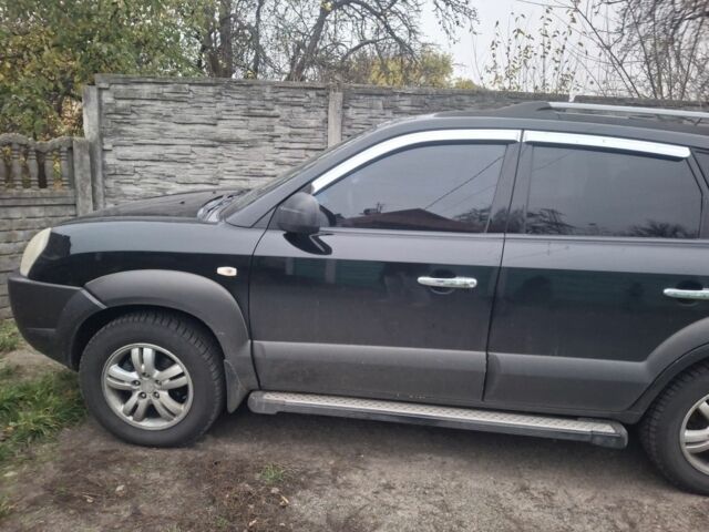 Черный Хендай Туксон, объемом двигателя 2 л и пробегом 224 тыс. км за 6800 $, фото 2 на Automoto.ua