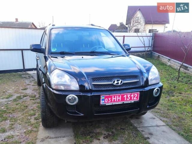 Черный Хендай Туксон, объемом двигателя 2 л и пробегом 208 тыс. км за 6950 $, фото 49 на Automoto.ua