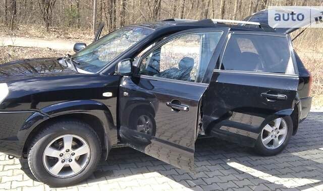 Черный Хендай Туксон, объемом двигателя 2 л и пробегом 210 тыс. км за 7000 $, фото 4 на Automoto.ua