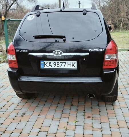 Чорний Хендай Туксон, об'ємом двигуна 1.98 л та пробігом 213 тис. км за 7500 $, фото 4 на Automoto.ua