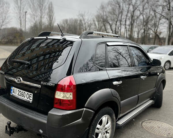 Чорний Хендай Туксон, об'ємом двигуна 1.98 л та пробігом 225 тис. км за 6600 $, фото 8 на Automoto.ua