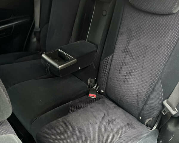 Чорний Хендай Туксон, об'ємом двигуна 1.98 л та пробігом 225 тис. км за 6600 $, фото 16 на Automoto.ua