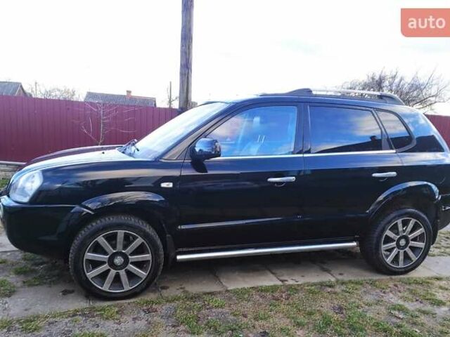 Черный Хендай Туксон, объемом двигателя 2 л и пробегом 208 тыс. км за 6950 $, фото 31 на Automoto.ua