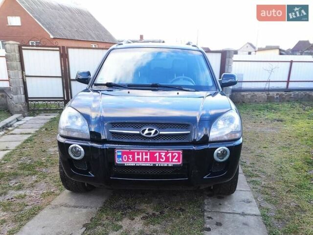 Черный Хендай Туксон, объемом двигателя 2 л и пробегом 208 тыс. км за 6950 $, фото 1 на Automoto.ua