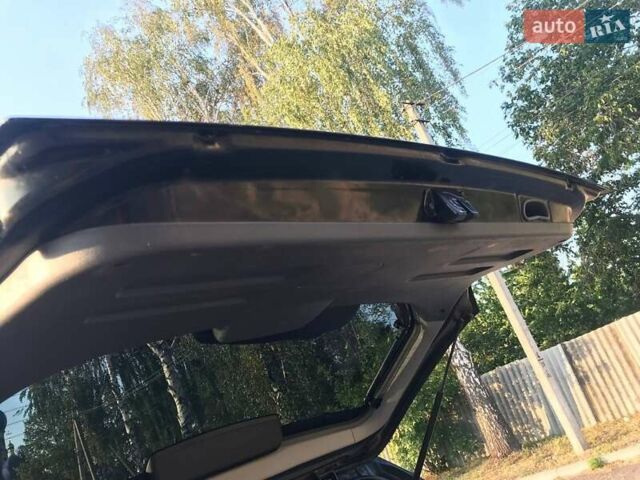 Черный Хендай Туксон, объемом двигателя 2 л и пробегом 253 тыс. км за 7500 $, фото 9 на Automoto.ua