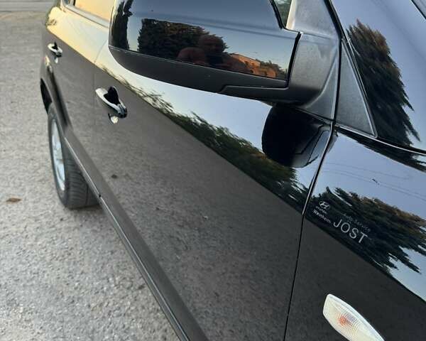 Хендай Туксон 2005 у Вознесенске на Automoto.ua Чорний Хендай Туксон, об'ємом двигуна 1.98 л та пробігом 144 тис. км за 7500 $, фото 6 на Automoto.ua