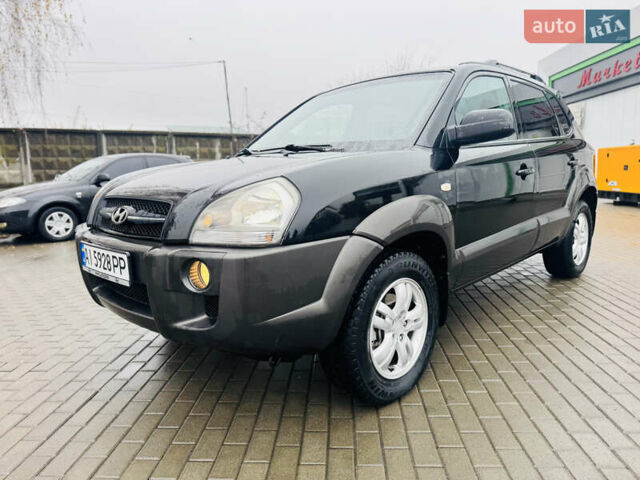 Черный Хендай Туксон, объемом двигателя 1.98 л и пробегом 252 тыс. км за 7300 $, фото 8 на Automoto.ua