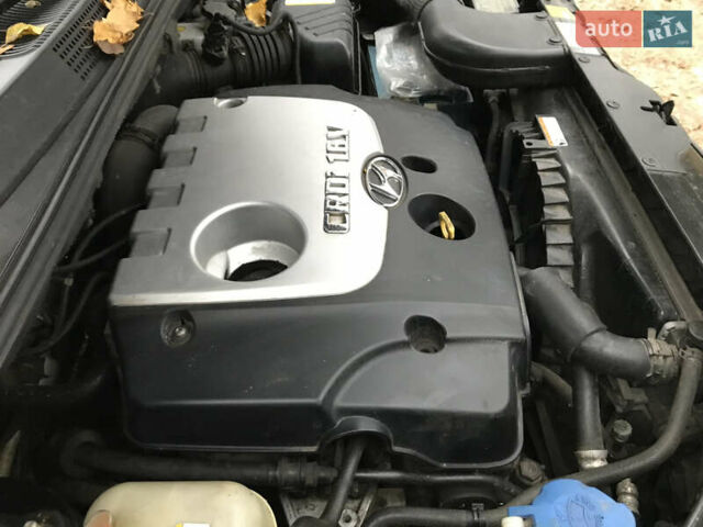 Черный Хендай Туксон, объемом двигателя 2 л и пробегом 261 тыс. км за 6500 $, фото 18 на Automoto.ua