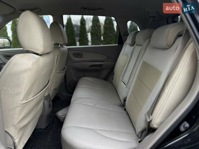 Черный Хендай Туксон, объемом двигателя 2.7 л и пробегом 220 тыс. км за 6950 $, фото 9 на Automoto.ua