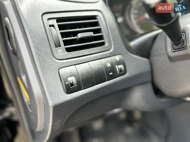 Черный Хендай Туксон, объемом двигателя 2 л и пробегом 210 тыс. км за 6600 $, фото 38 на Automoto.ua