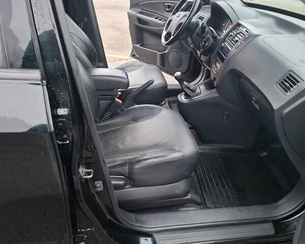 Черный Хендай Туксон, объемом двигателя 2 л и пробегом 170 тыс. км за 6999 $, фото 8 на Automoto.ua