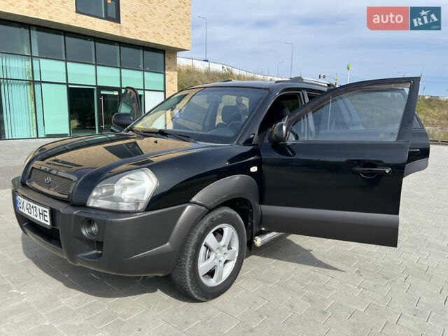Чорний Хендай Туксон, об'ємом двигуна 2 л та пробігом 255 тис. км за 6900 $, фото 25 на Automoto.ua