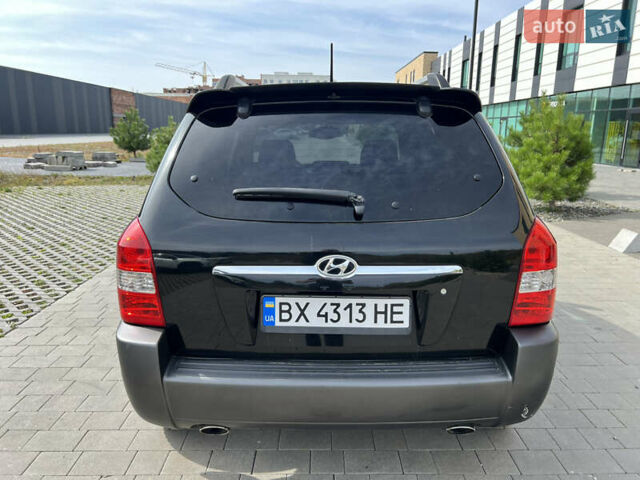 Чорний Хендай Туксон, об'ємом двигуна 2 л та пробігом 255 тис. км за 6900 $, фото 6 на Automoto.ua