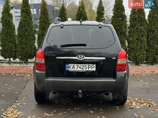 Черный Хендай Туксон, объемом двигателя 2.7 л и пробегом 220 тыс. км за 6400 $, фото 4 на Automoto.ua