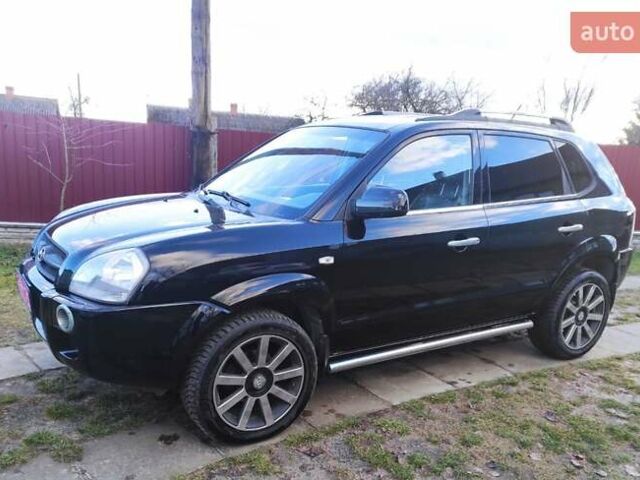 Черный Хендай Туксон, объемом двигателя 2 л и пробегом 208 тыс. км за 6950 $, фото 34 на Automoto.ua