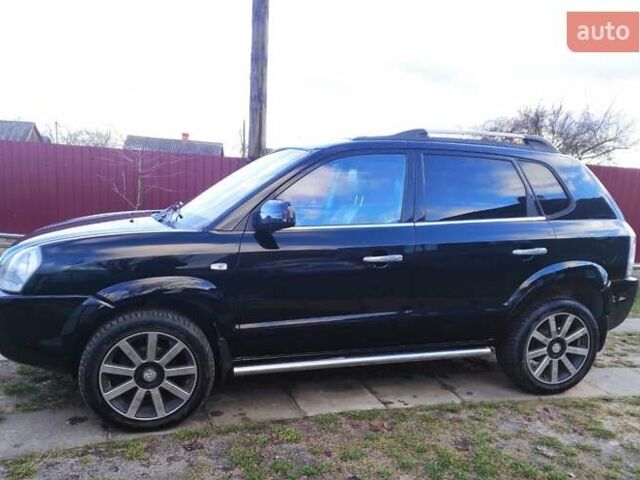 Черный Хендай Туксон, объемом двигателя 2 л и пробегом 208 тыс. км за 6950 $, фото 32 на Automoto.ua