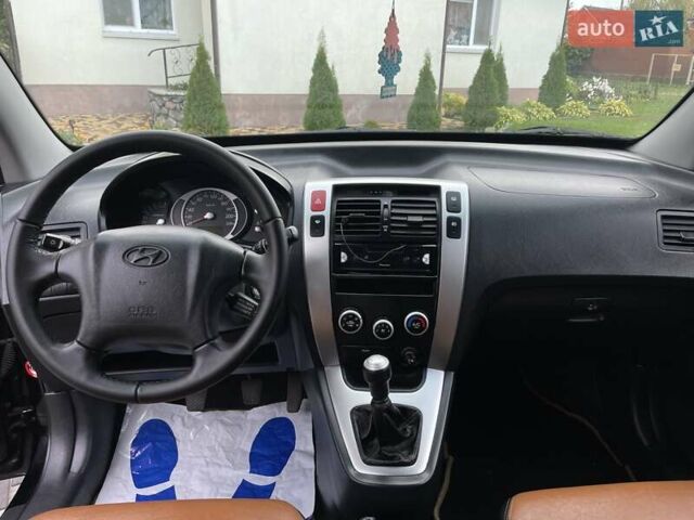 Хендай Туксон 2005 у Хороле на Automoto.ua Чорний Хендай Туксон, об'ємом двигуна 2 л та пробігом 163 тис. км за 7700 $, фото 8 на Automoto.ua