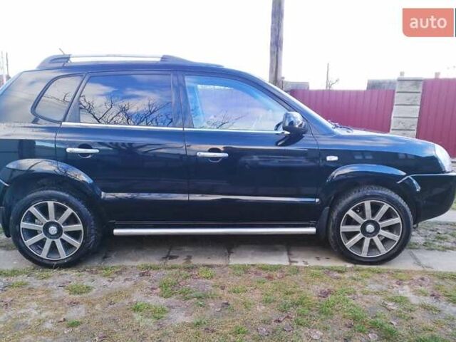 Черный Хендай Туксон, объемом двигателя 2 л и пробегом 208 тыс. км за 6950 $, фото 5 на Automoto.ua