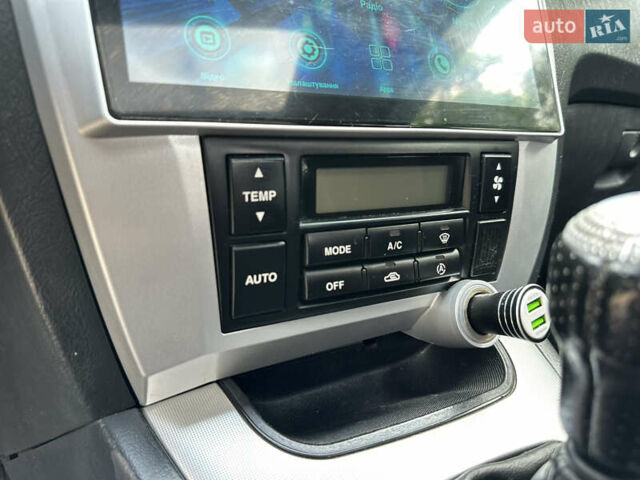 Черный Хендай Туксон, объемом двигателя 2 л и пробегом 210 тыс. км за 6600 $, фото 44 на Automoto.ua