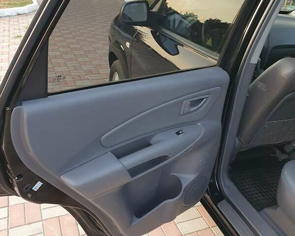 Чорний Хендай Туксон, об'ємом двигуна 1.98 л та пробігом 137 тис. км за 7599 $, фото 15 на Automoto.ua
