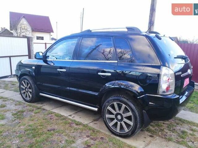 Черный Хендай Туксон, объемом двигателя 2 л и пробегом 208 тыс. км за 6950 $, фото 38 на Automoto.ua