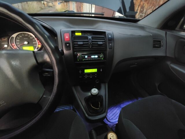 Черный Хендай Туксон, объемом двигателя 2 л и пробегом 370 тыс. км за 3300 $, фото 5 на Automoto.ua