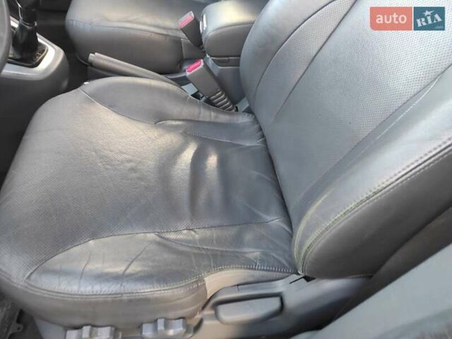 Черный Хендай Туксон, объемом двигателя 2 л и пробегом 208 тыс. км за 6950 $, фото 15 на Automoto.ua