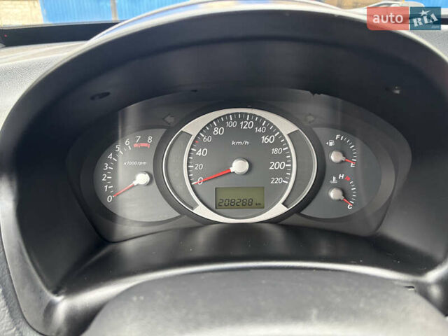 Черный Хендай Туксон, объемом двигателя 1.98 л и пробегом 215 тыс. км за 8600 $, фото 14 на Automoto.ua