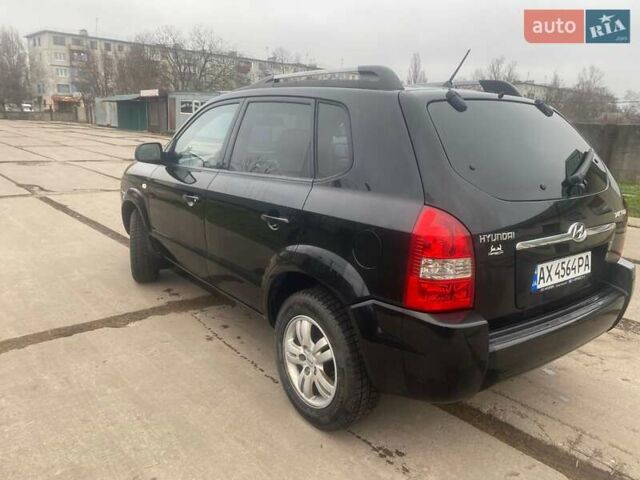 Черный Хендай Туксон, объемом двигателя 2 л и пробегом 190 тыс. км за 7500 $, фото 1 на Automoto.ua