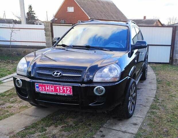 Черный Хендай Туксон, объемом двигателя 2 л и пробегом 208 тыс. км за 6950 $, фото 29 на Automoto.ua