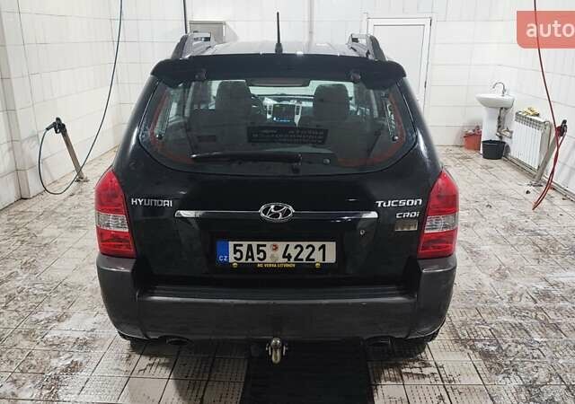 Черный Хендай Туксон, объемом двигателя 2 л и пробегом 284 тыс. км за 4700 $, фото 17 на Automoto.ua