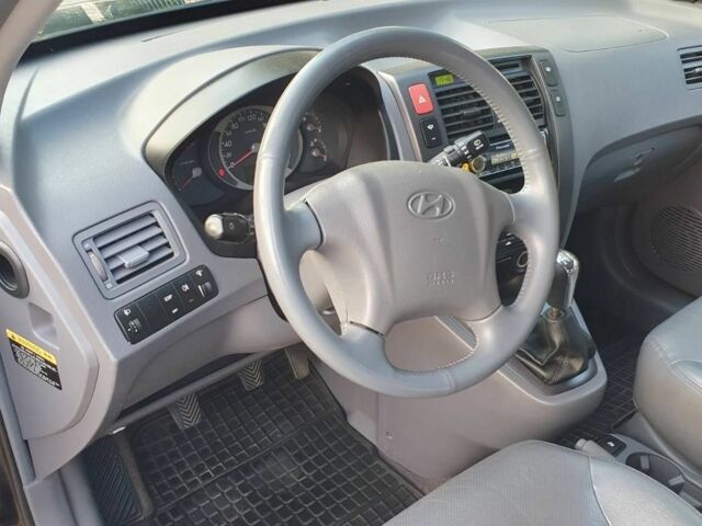 Черный Хендай Туксон, объемом двигателя 2 л и пробегом 137 тыс. км за 7499 $, фото 12 на Automoto.ua