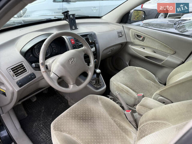 Черный Хендай Туксон, объемом двигателя 2 л и пробегом 211 тыс. км за 4444 $, фото 8 на Automoto.ua
