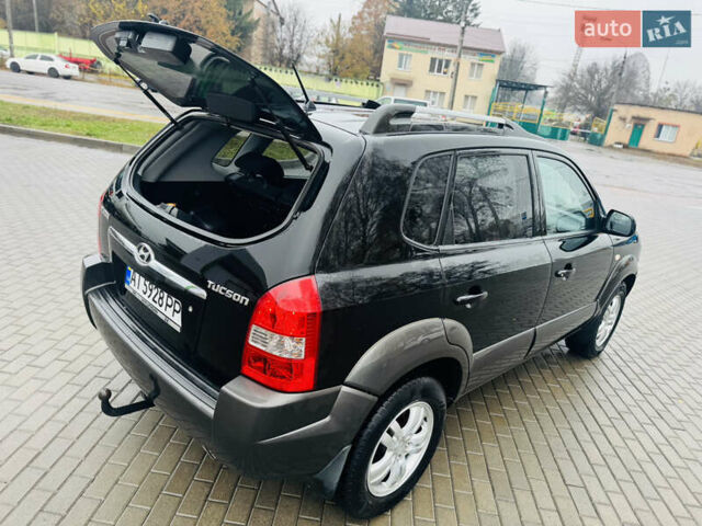 Черный Хендай Туксон, объемом двигателя 1.98 л и пробегом 252 тыс. км за 7300 $, фото 9 на Automoto.ua