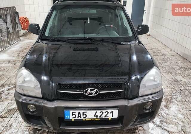 Черный Хендай Туксон, объемом двигателя 2 л и пробегом 284 тыс. км за 4700 $, фото 19 на Automoto.ua