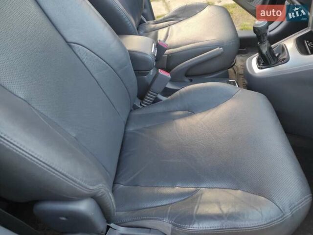 Черный Хендай Туксон, объемом двигателя 2 л и пробегом 208 тыс. км за 6950 $, фото 27 на Automoto.ua