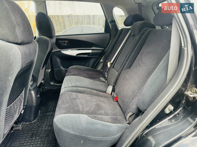 Черный Хендай Туксон, объемом двигателя 1.98 л и пробегом 252 тыс. км за 7300 $, фото 18 на Automoto.ua