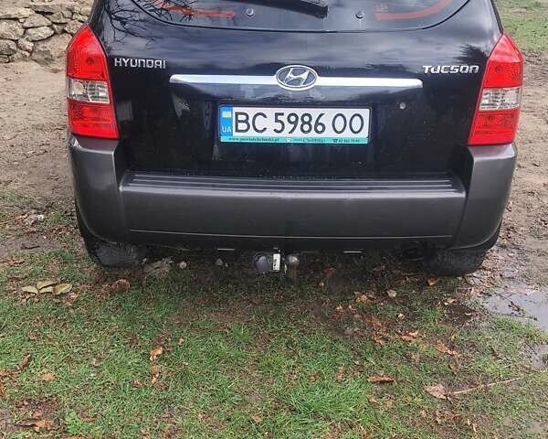 Черный Хендай Туксон, объемом двигателя 2 л и пробегом 299 тыс. км за 6000 $, фото 1 на Automoto.ua