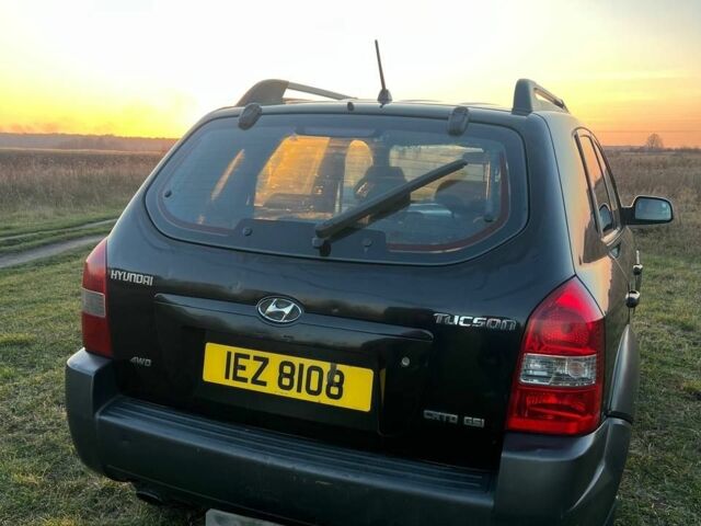 Черный Хендай Туксон, объемом двигателя 2 л и пробегом 137 тыс. км за 4300 $, фото 6 на Automoto.ua