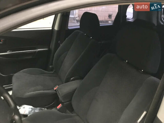 Черный Хендай Туксон, объемом двигателя 2 л и пробегом 261 тыс. км за 6500 $, фото 13 на Automoto.ua